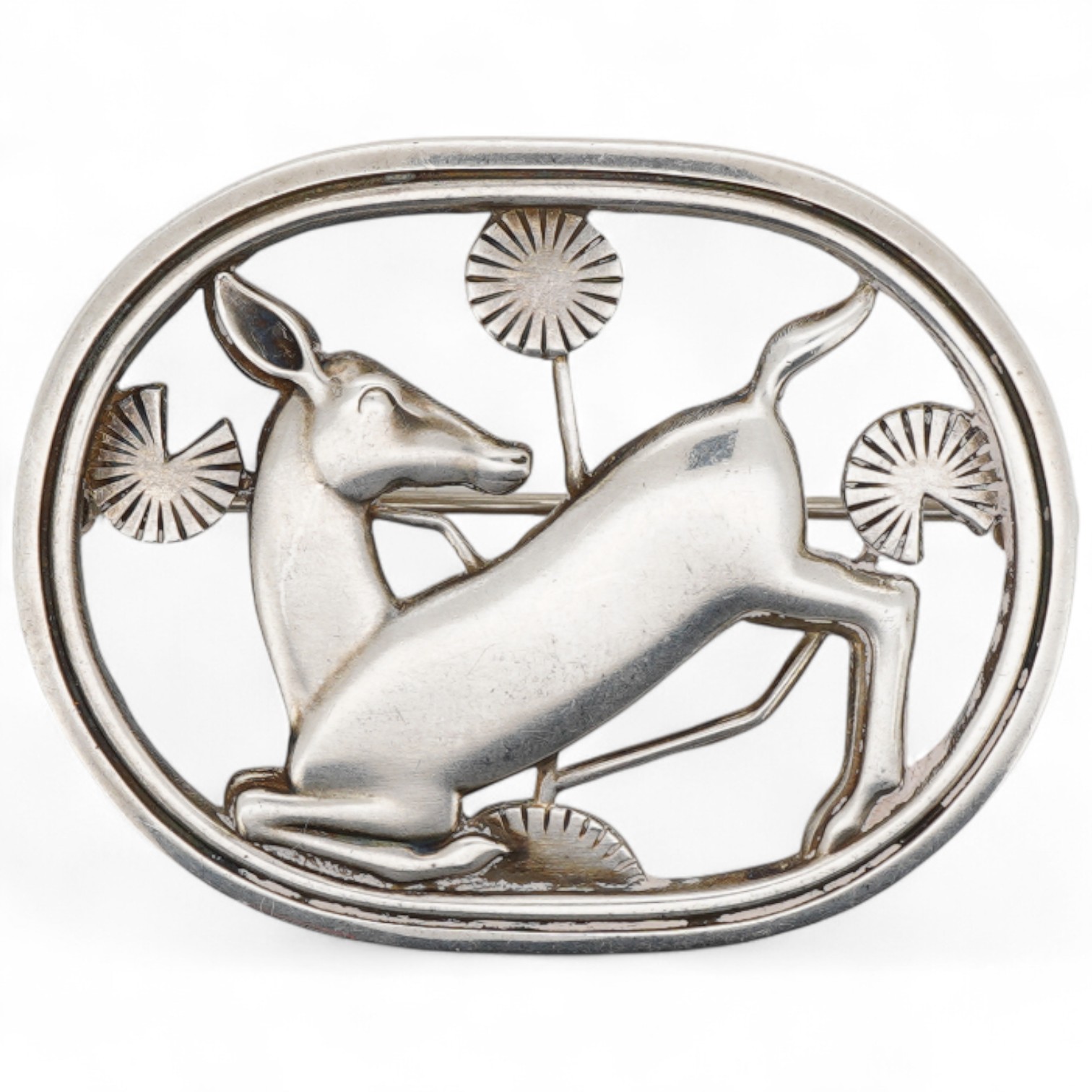 A Georg Jensen sterling kneeling deer oval brooch, design no. 256, 44mm.